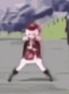 a blurred image of a person dancing in a field in a video game .