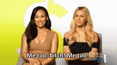 two women are sitting next to each other with their arms crossed and one of them is saying me too bitch me too !