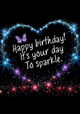 a happy birthday card with a heart made of lights and sparkles