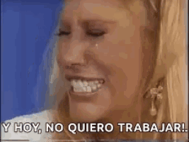 a woman is crying and smiling in spanish .
