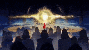 a group of people are standing around a circle in a dark room watching a fireball coming out of the sky .