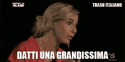 a woman in a red shirt says svegliata in front of a black background
