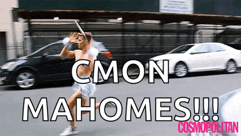 a shirtless man is running down a street with the words " cmon mahomes " behind him