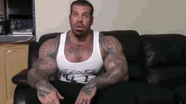 a man with a tattoo on his chest that says " i love you "