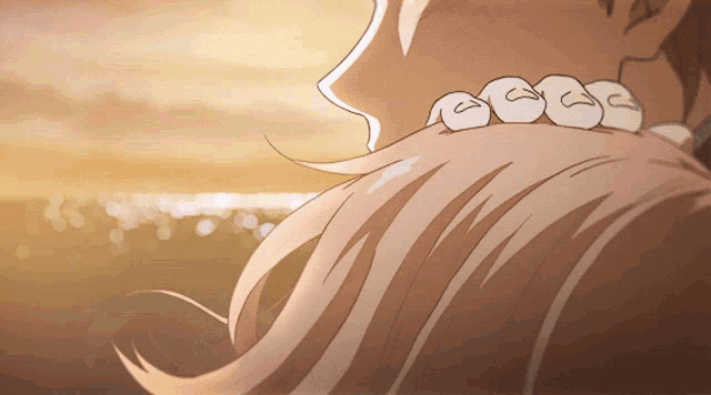 a close up of a person 's neck with a necklace of teeth on it