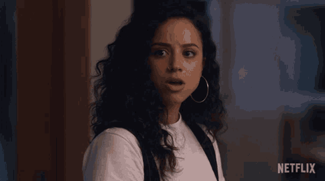 a woman with a surprised look on her face is featured on a netflix ad