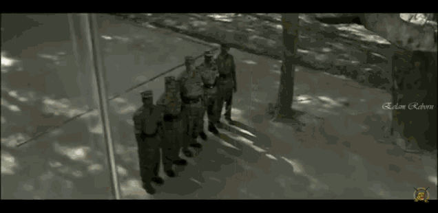 a group of soldiers are standing in front of a flag with the word eden written on the bottom right corner