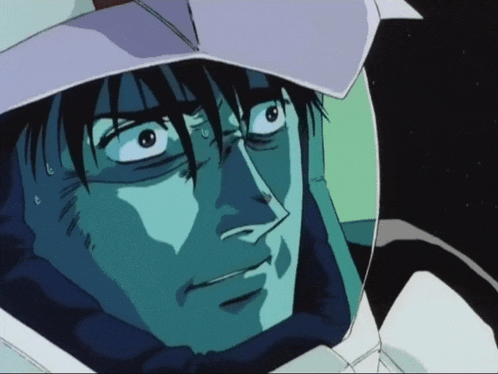 a close up of a man wearing a helmet