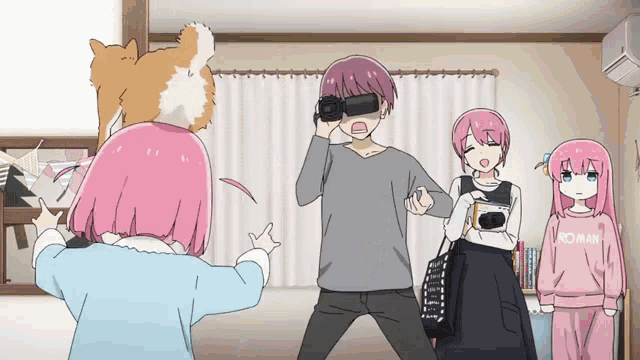 a man wearing a virtual reality headset is surrounded by two girls and a dog