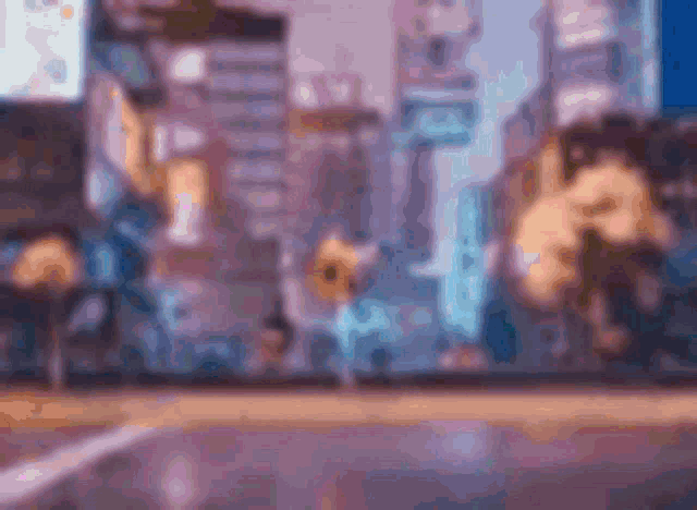 a blurry picture of a city street at night with a sign that says ' a ' on it