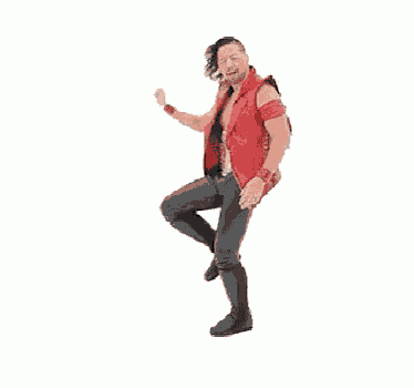 a man wearing a red jacket and black pants is standing on a white background .