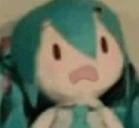 a close up of a stuffed toy with a surprised face .