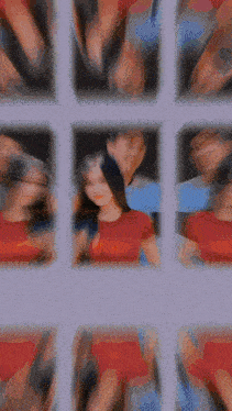 a blurry picture of a man and a woman with a purple background