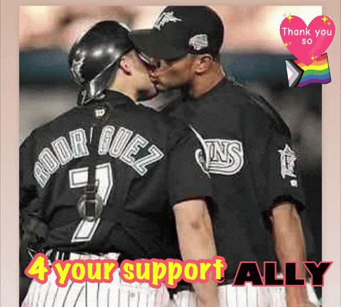 a baseball player with rodriguez on the back of his jersey kisses another player