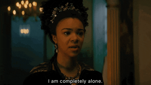 a woman with a tiara on her head is saying i am completely alone