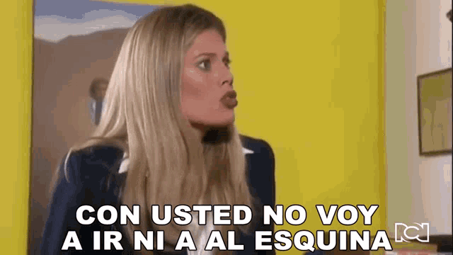 a woman in a suit says con usted no voy a ir ni al esquina