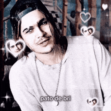 a man wearing a hat and a necklace with the words pato de bri written on it