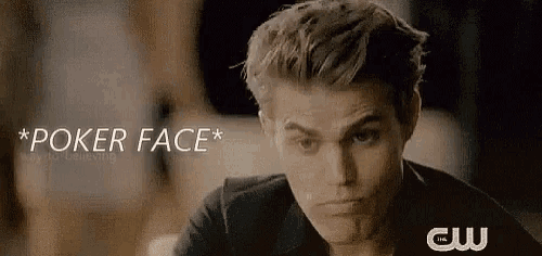 a close up of a man 's face with the words `` poker face '' written on it .