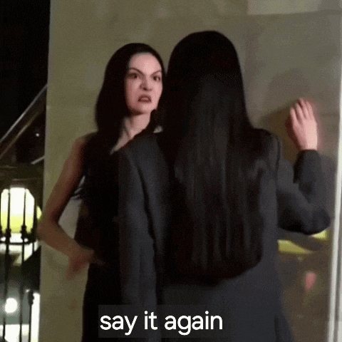 two women standing next to each other with the words say it again written below them