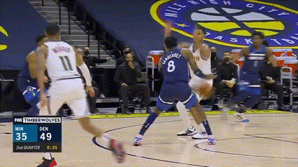a basketball game between the timberwolves and the denver nuggets