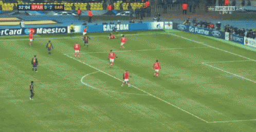 a soccer game is being played in front of a uefa com banner