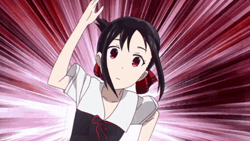 a girl with red eyes and a bow in her hair is waving her hand in the air