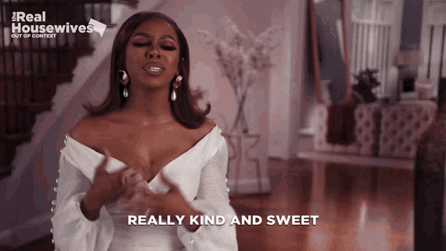 a woman says really kind and sweet in front of a real housewives logo