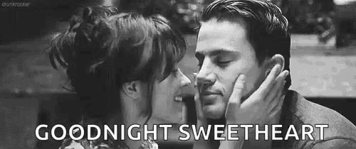a black and white photo of a man and woman kissing with the words `` goodnight sweetheart '' .