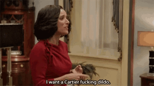 a woman in a red dress is saying i want a cartier fucking dildo