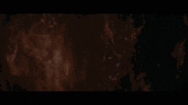 a computer generated image of a fire with a dark background