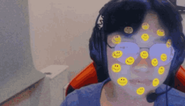 a person with smiley faces on their face