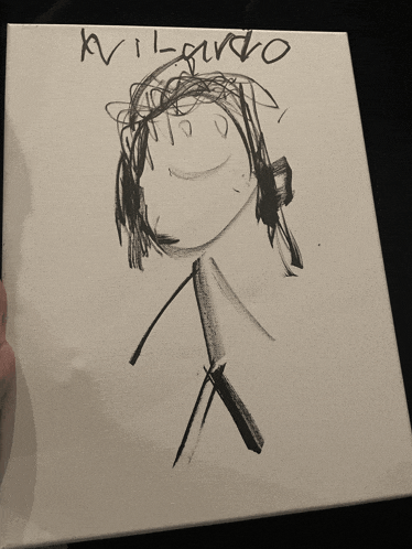 a child 's drawing of a stick figure with the name avilando written on the bottom