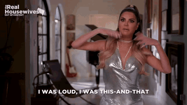 a woman in a silver dress says " i was loud i was this and that "
