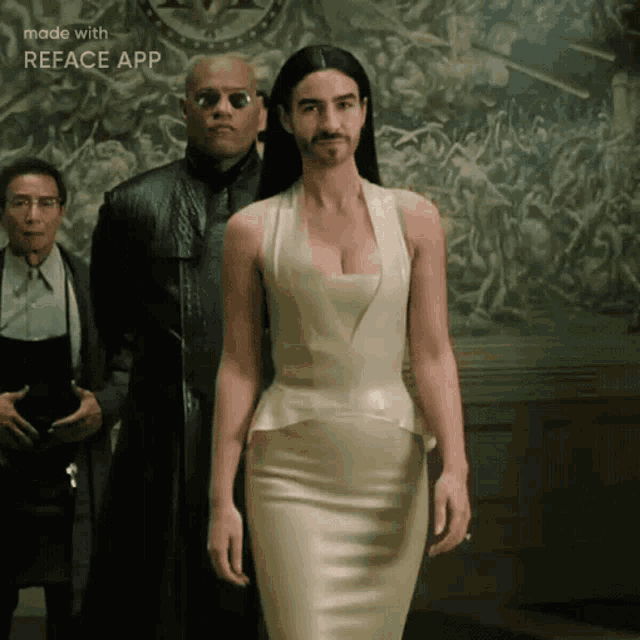 a woman in a white dress is standing next to a man with a beard and the words made with reface app on the bottom