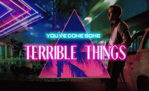 a man is standing in front of a car with the words terrible things written on it