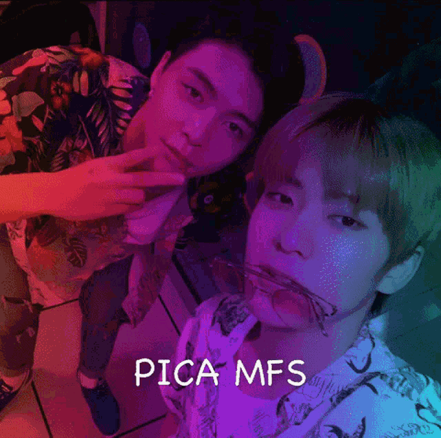 two young men posing for a picture with the words pica mfs on the bottom right