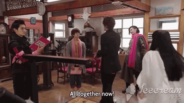 a group of people standing in a room with the words all together now on the bottom