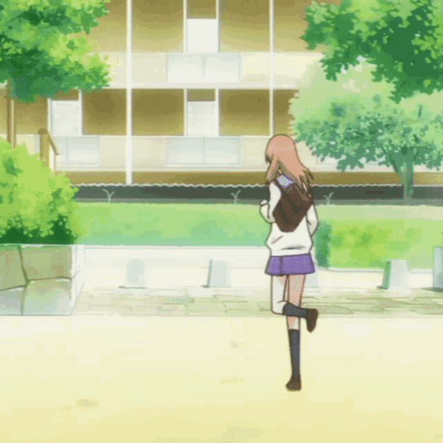 a girl in a white sweater and purple skirt is running on a sidewalk