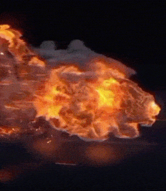 a close up of a fire explosion with a black background