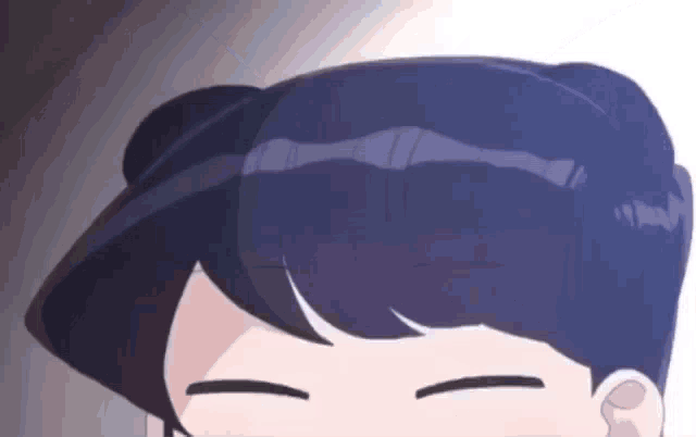 a close up of a person 's face with their eyes closed and a bun in their hair .