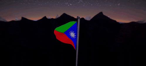 a red green and blue flag with a white star in the center