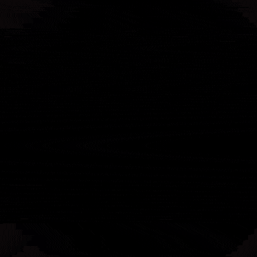 a blurred image of a box with a purple object in the middle