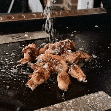 Seasoning Chicken Wings Matthew Hussey GIF - Seasoning Chicken Wings Matthew Hussey The Hungry Hussey GIFs