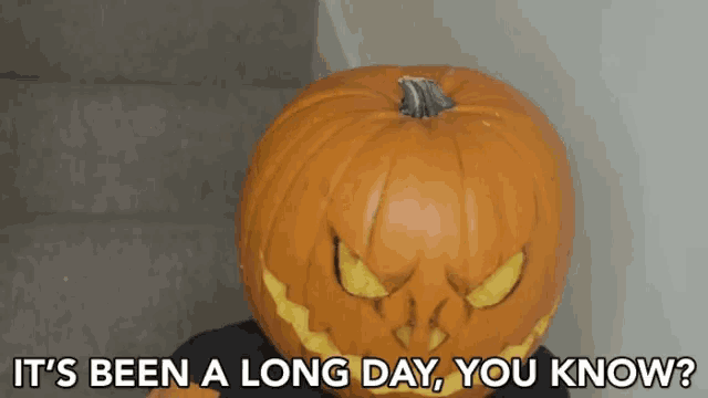 a carved pumpkin with the words it 's been a long day you know below it