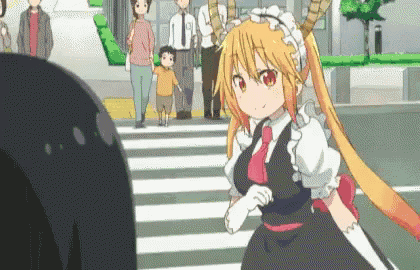 a girl in a maid outfit is standing on a crosswalk next to a dragon .