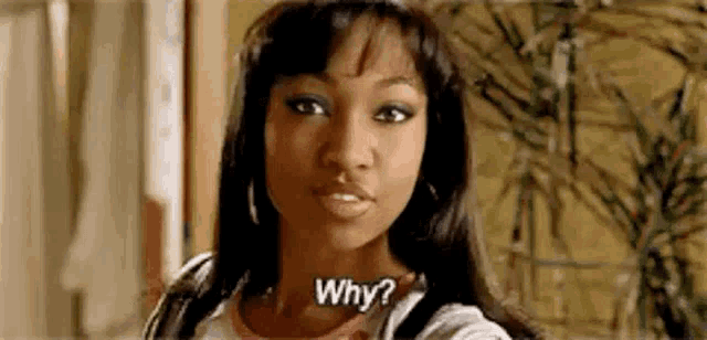 a woman is asking why in a room .