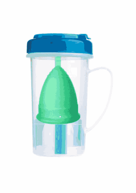 a clear cup with a blue lid has a black item in it