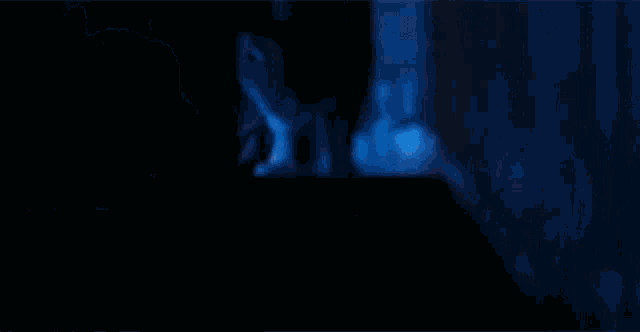 the word tahbect is written in red on a dark blue background .