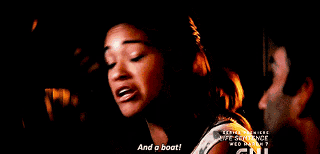 a woman says " and a boat " in front of a life sentence ad
