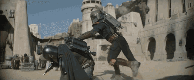 a man in a black armor with a gun on his back